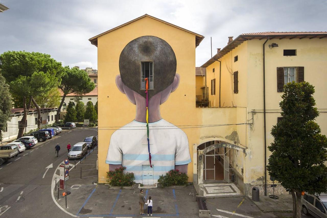 Seth GlobePainter unveils 'Escape', a new mural in Arezzo, Italy. #StreetArt #Graffiti #Mural http://t.co/DUpcdvNIiX