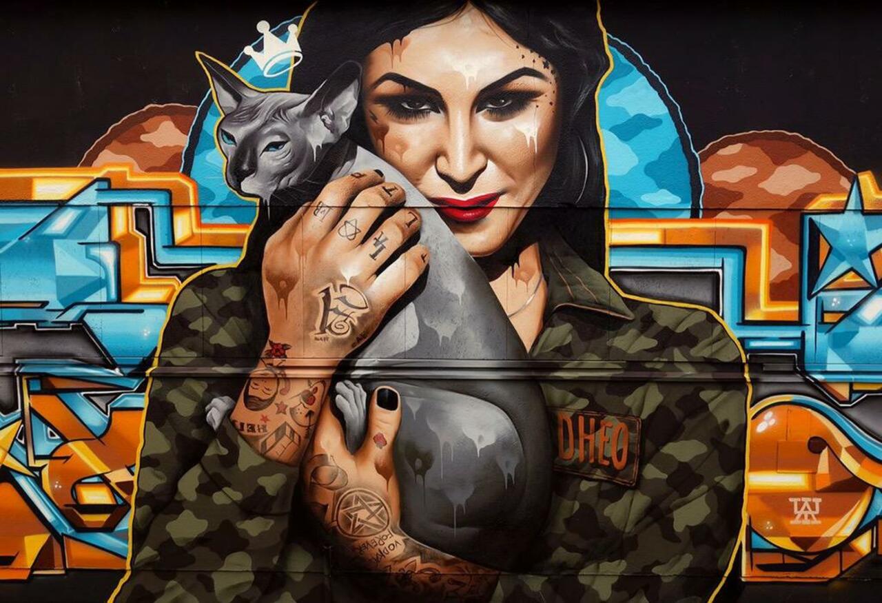 RT @AlexFromLIA: #UrbanArt #Graffiti #StreetArt...#MrDHEO "Kitty Kat" 2015 http://t.co/pKdQgpHyQ1