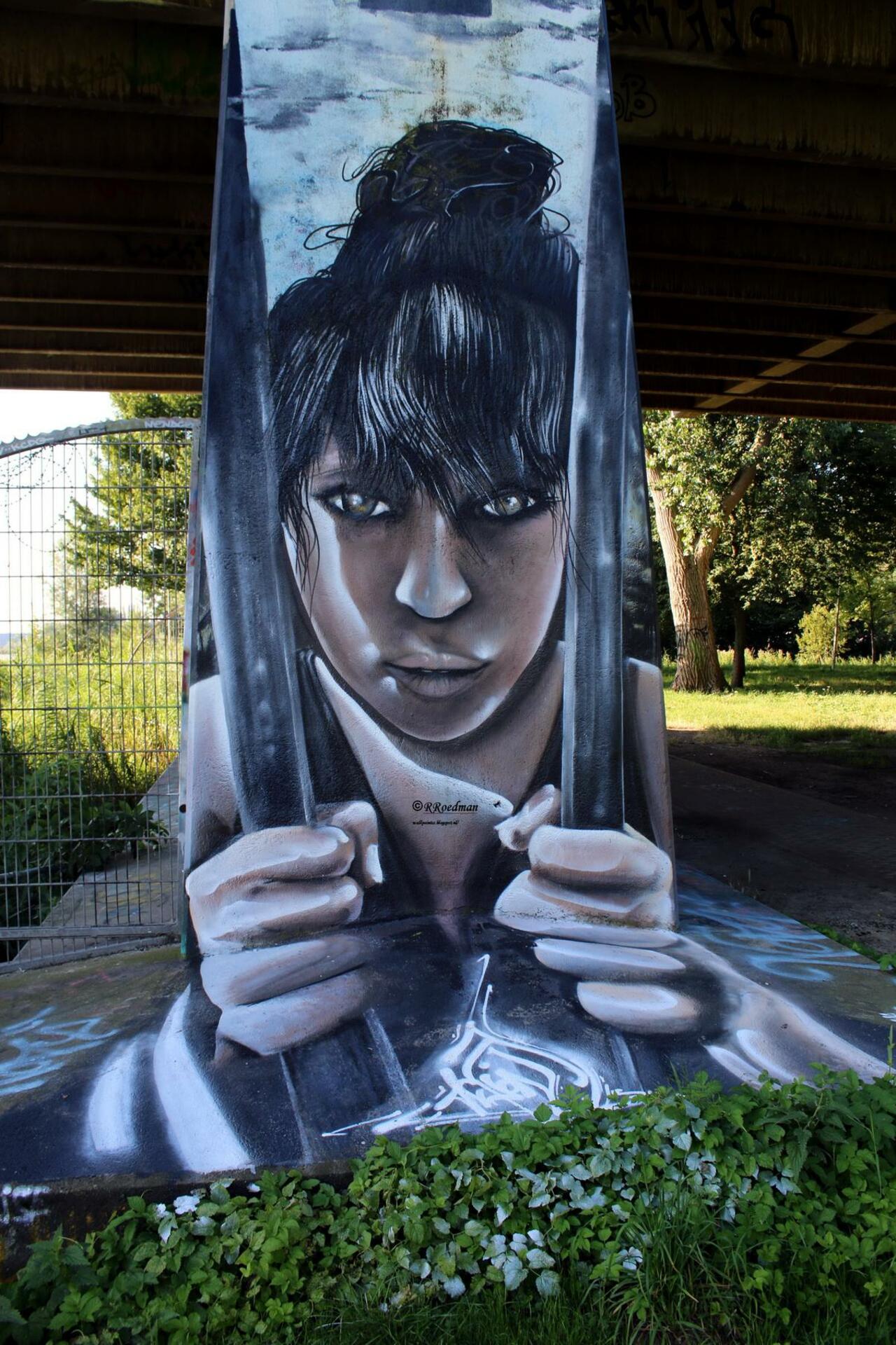 RT @RRoedman: #streetart #graffiti #mural girl behind bars in #Amsterdam ,2 pics at http://wallpaintss.blogspot.nl http://t.co/q8lVBh7zer