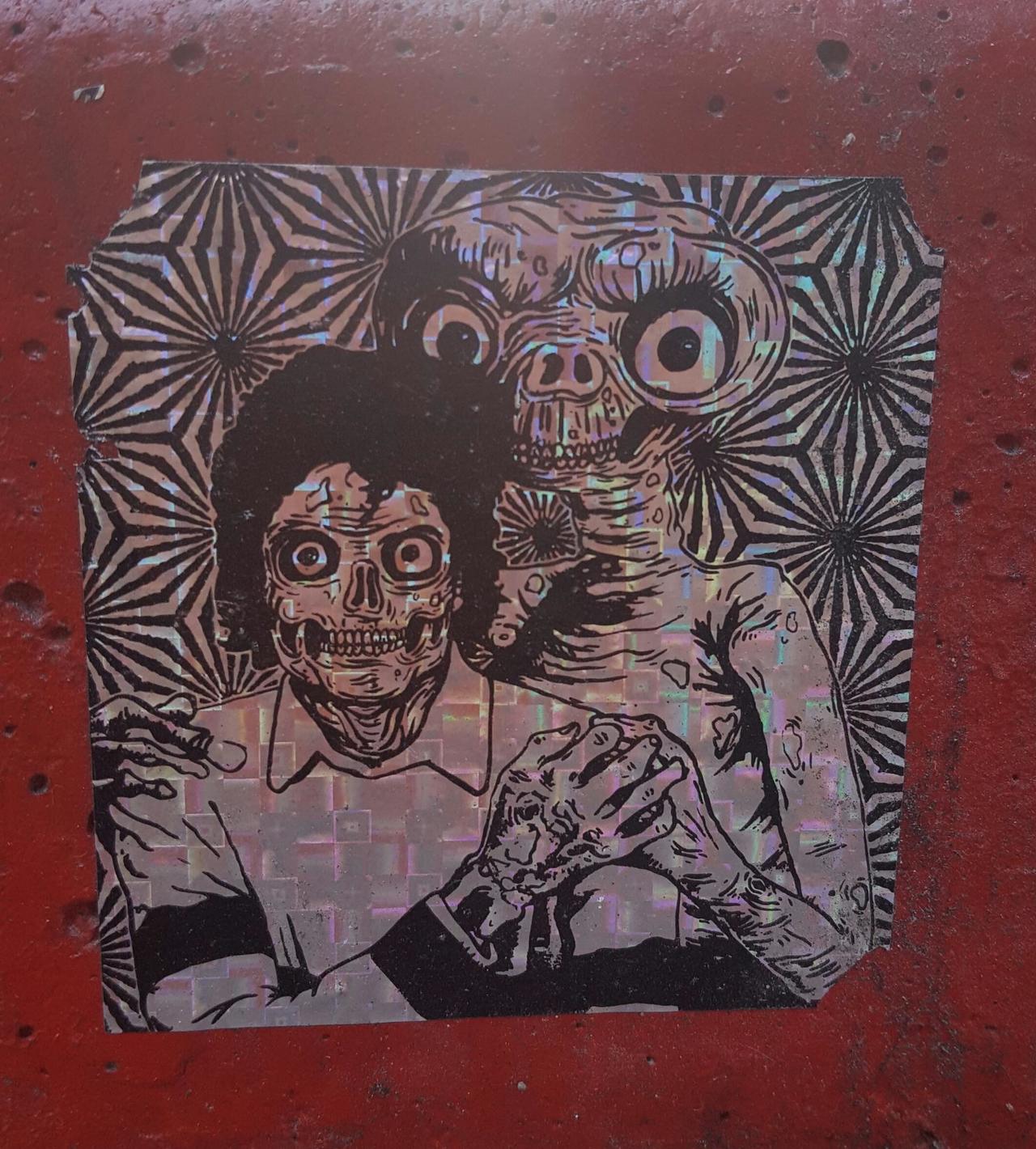 Michael Jackson and ET. Not sure of the artist, but it looks like #Skam #stickers #graffiti #streetart #SanFrancisco http://t.co/gdYcHVxlH3