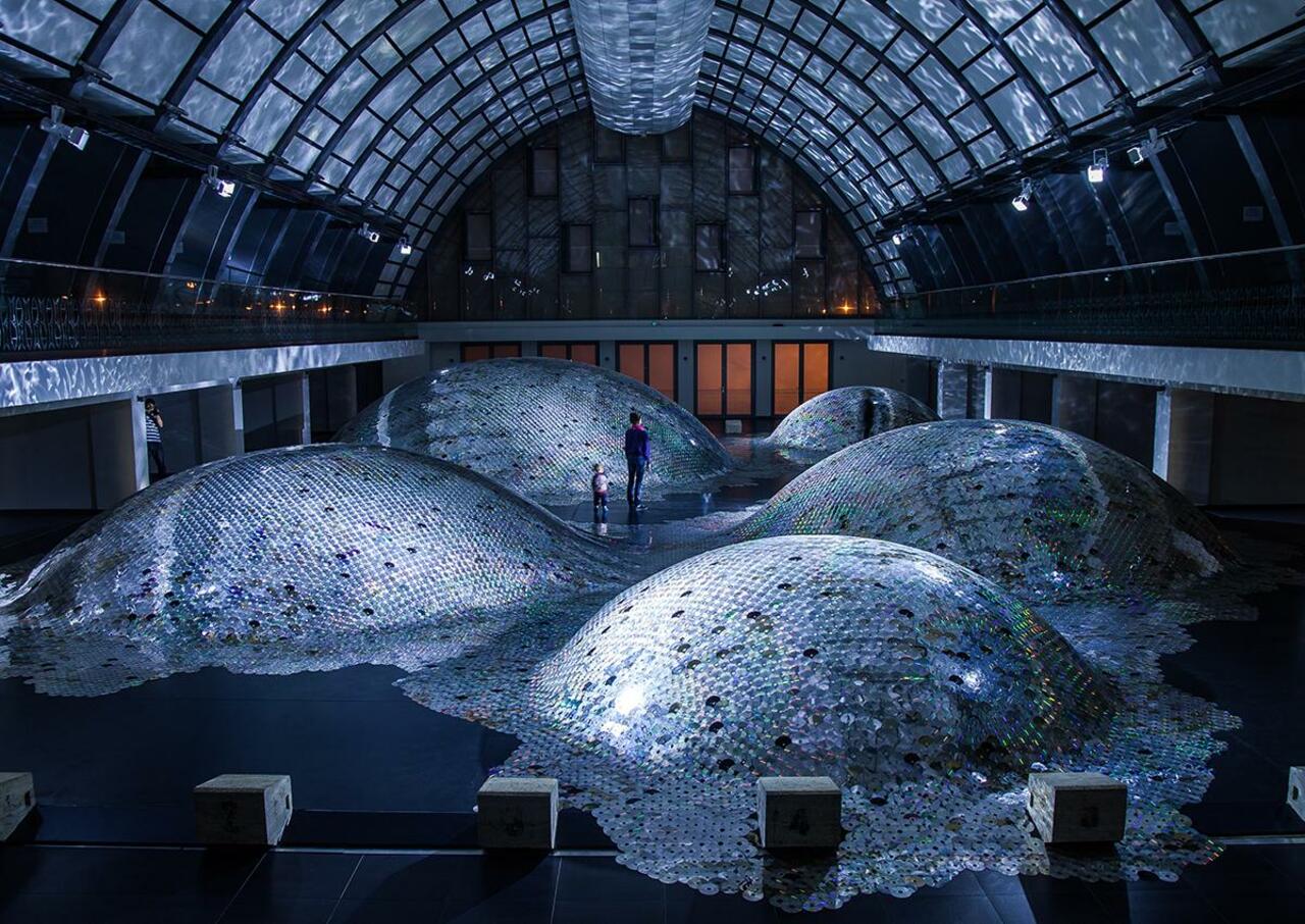 Amazing rolling landscape made of 60,000 old CDs http://bit.ly/14pIevW #recycledart #art #design #music #EliseMorin http://t.co/713hfgTdjg