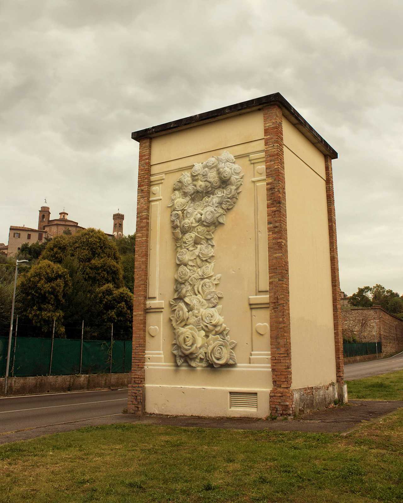 A Fist of Flowers Presents a Message of Unity on the Streets of Santarcangelo